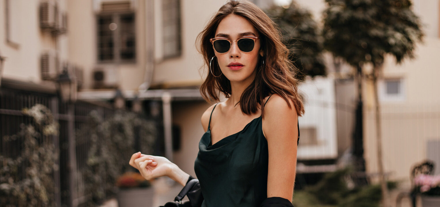 Stylish woman in sunglasses embodying luxury lifestyle at Hilton Residences Dubai JLT